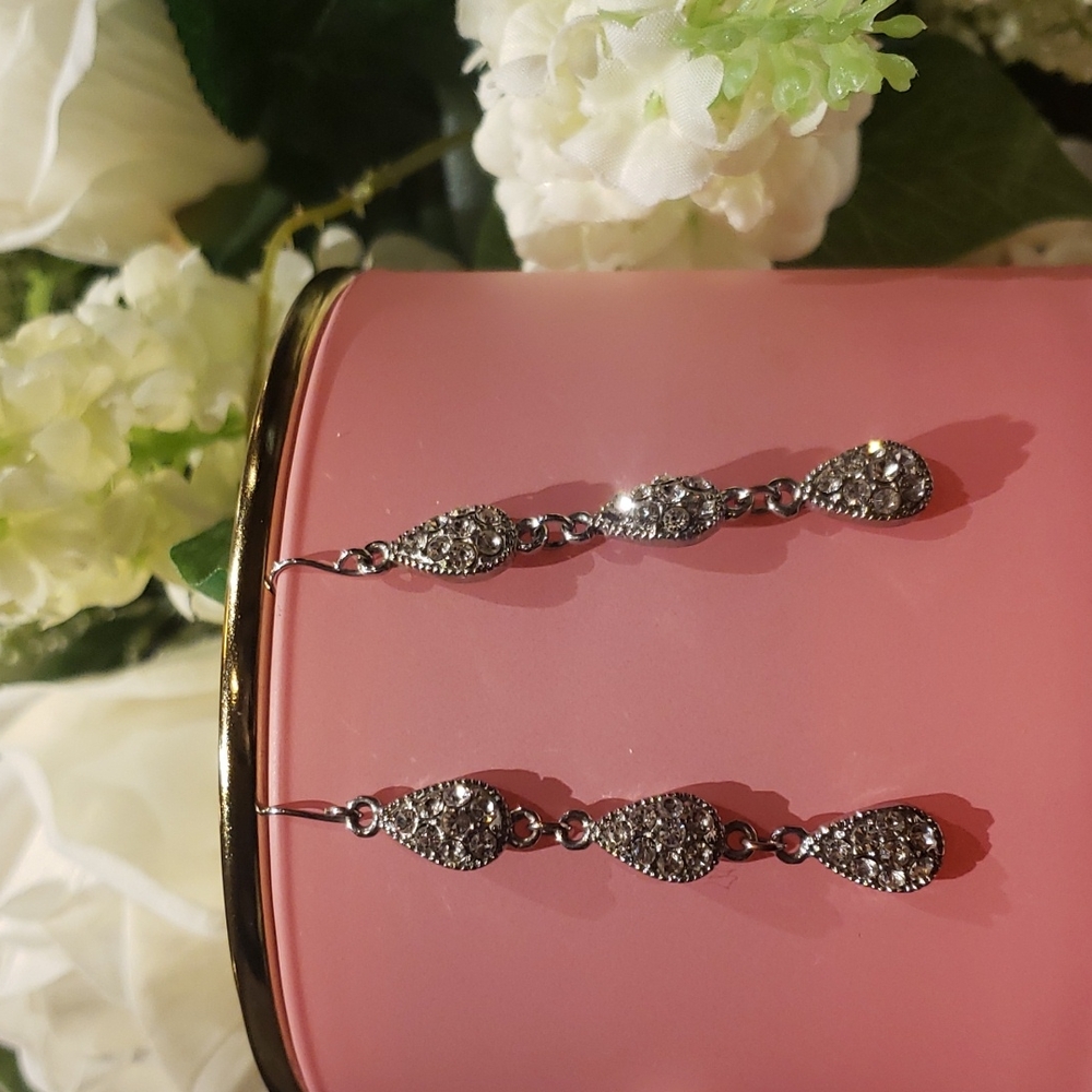 Delicate statement earings with zirconia